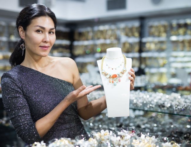 jeweler showing a piece of jewelry